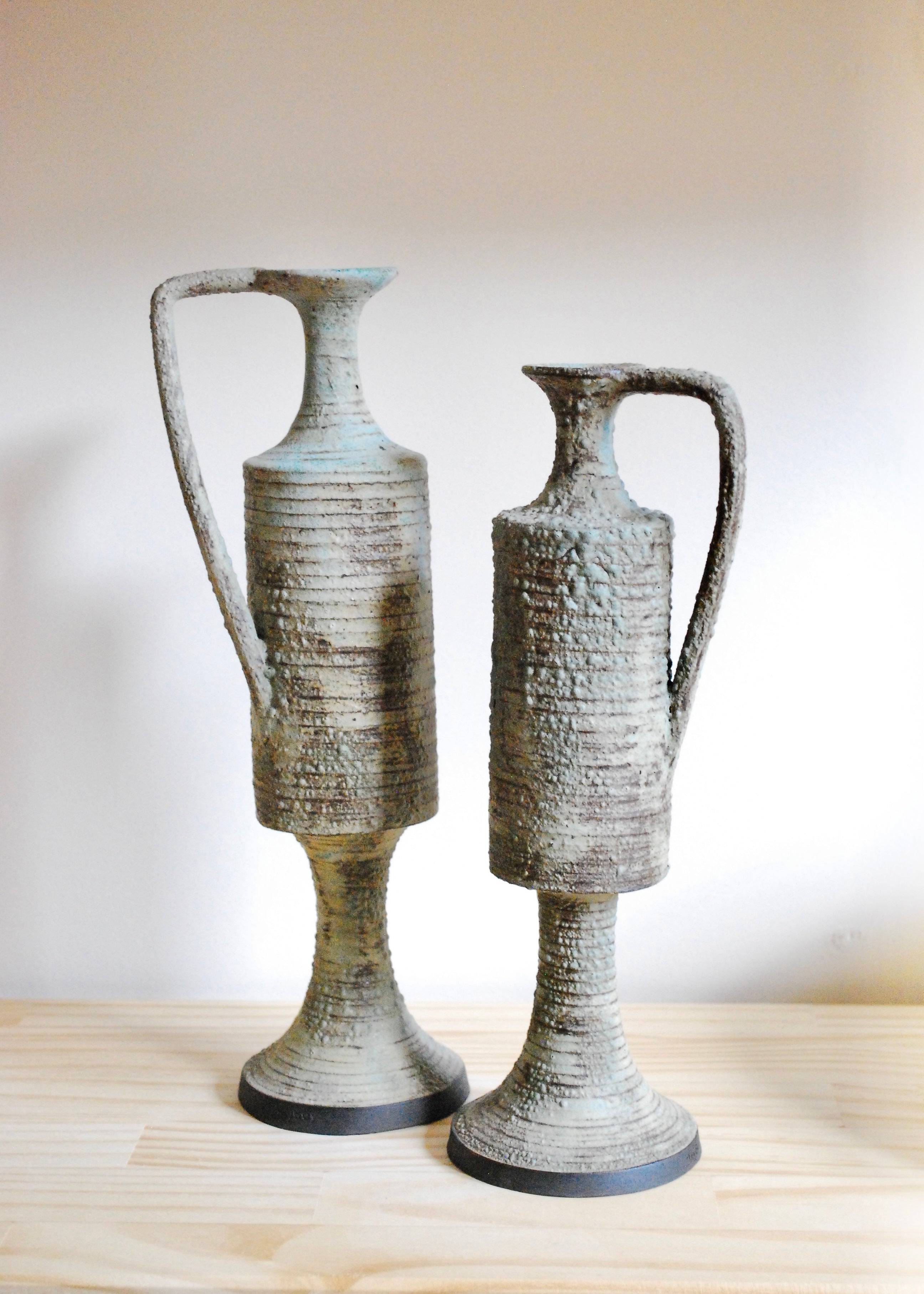 Ornate handmade ceramic pitcher jug with handle and textural worn glaze in Sea foam and gray