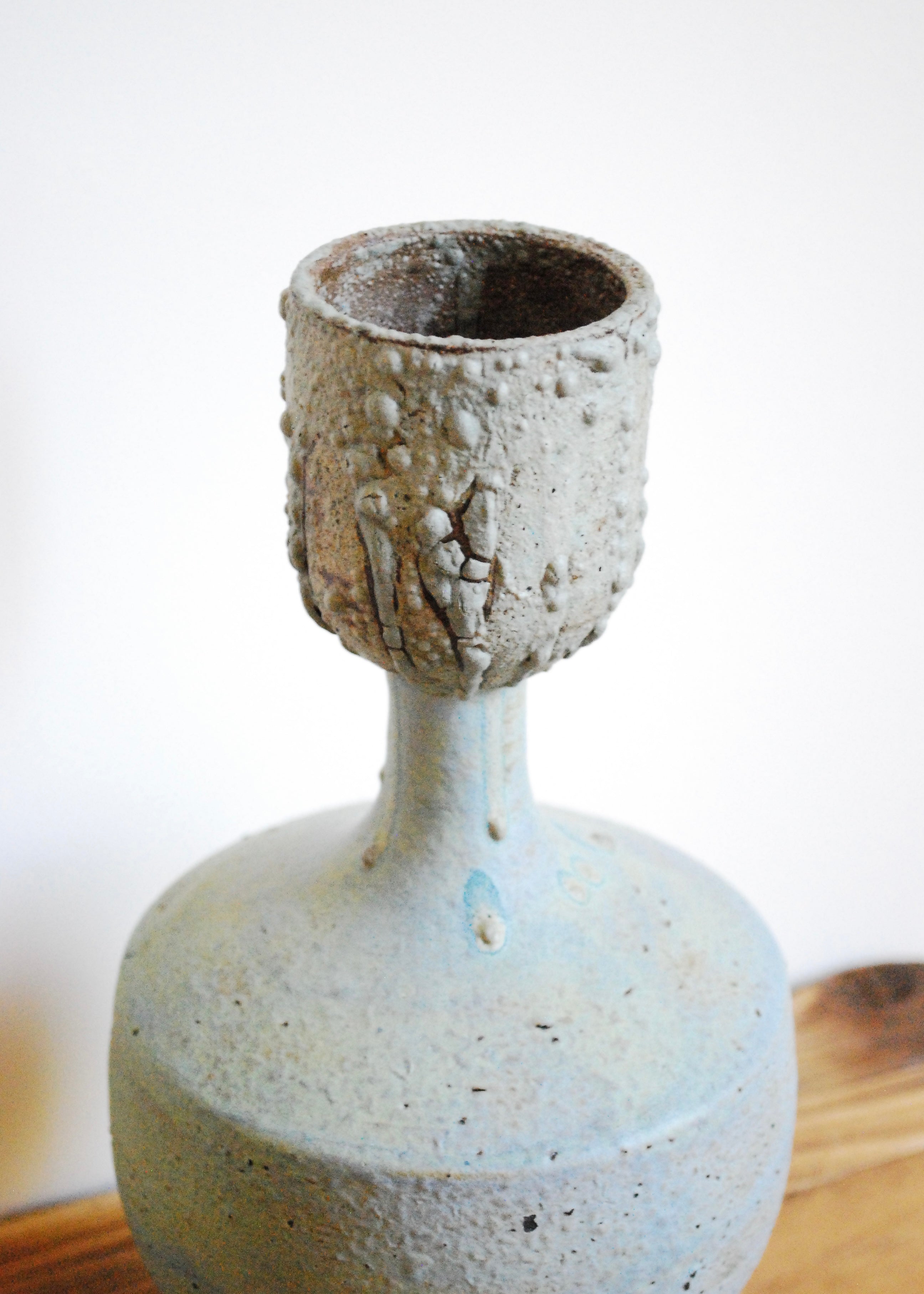Ornate handmade ceramic vase or vessel with cupped top and textural worn glaze in Sea foam green and gray