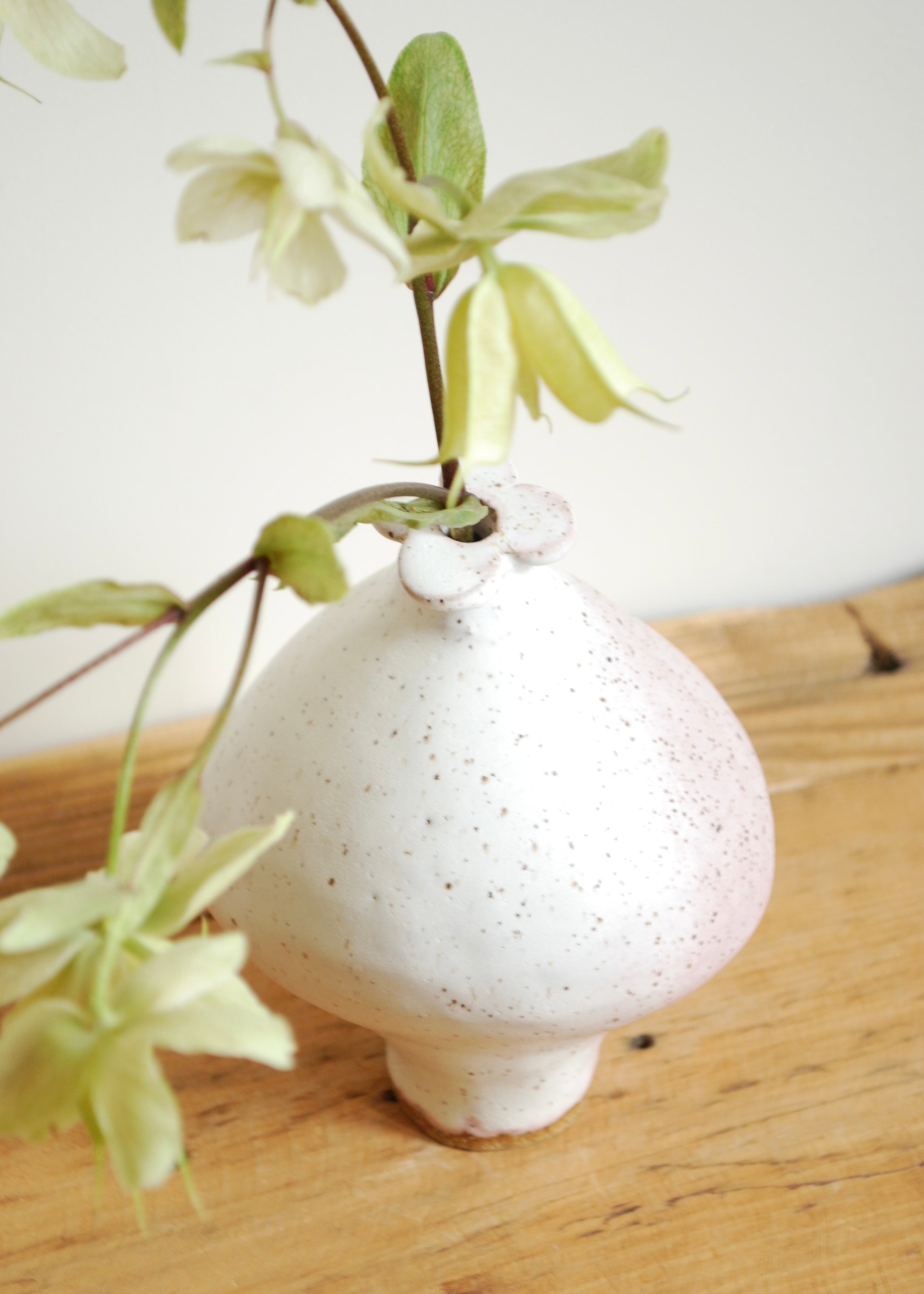 handmade speckled glaze ceramic mini blueberry shaped vase with pink hue