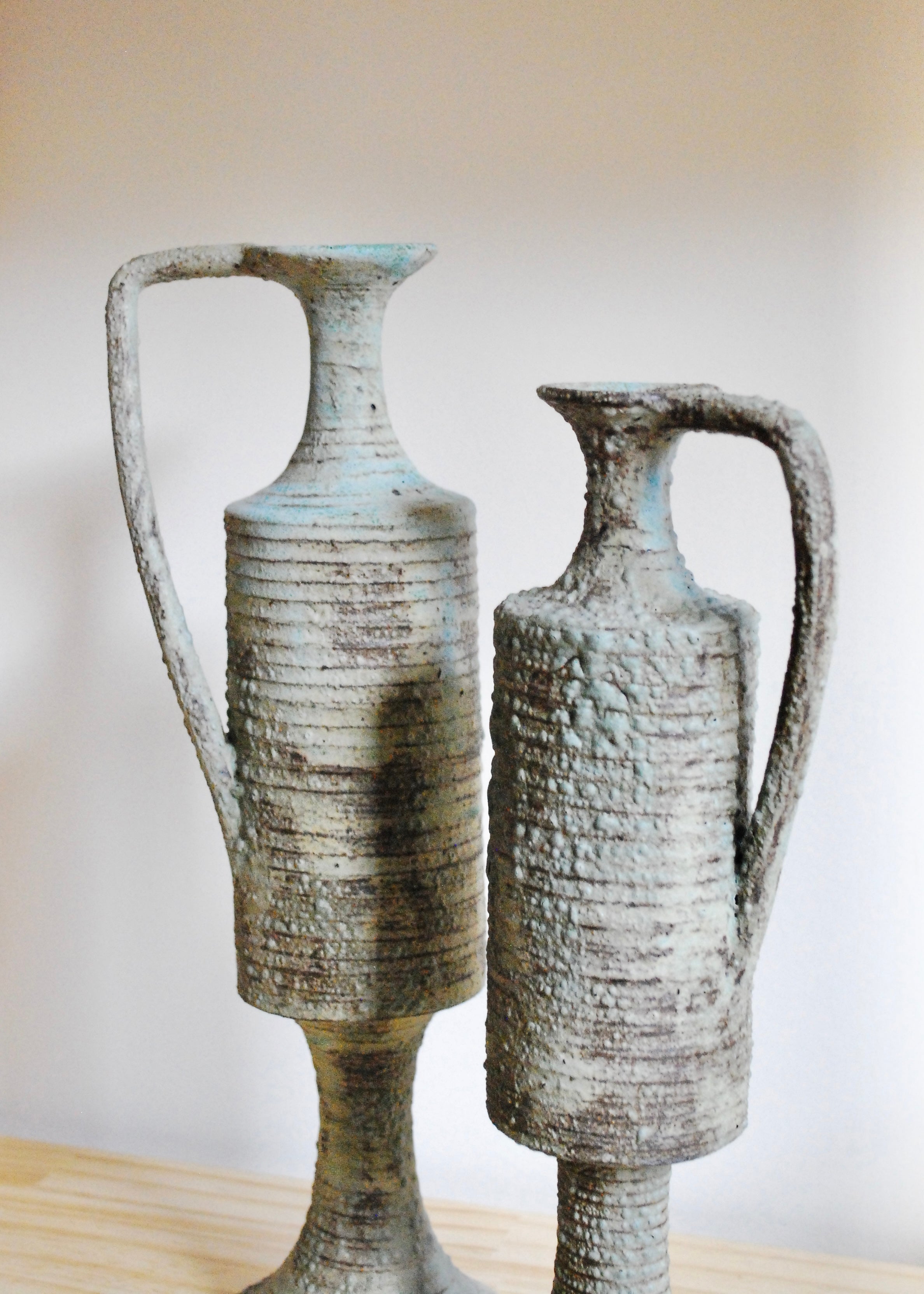 Ornate handmade ceramic pitcher jug with handle and textural worn glaze in Sea foam and gray