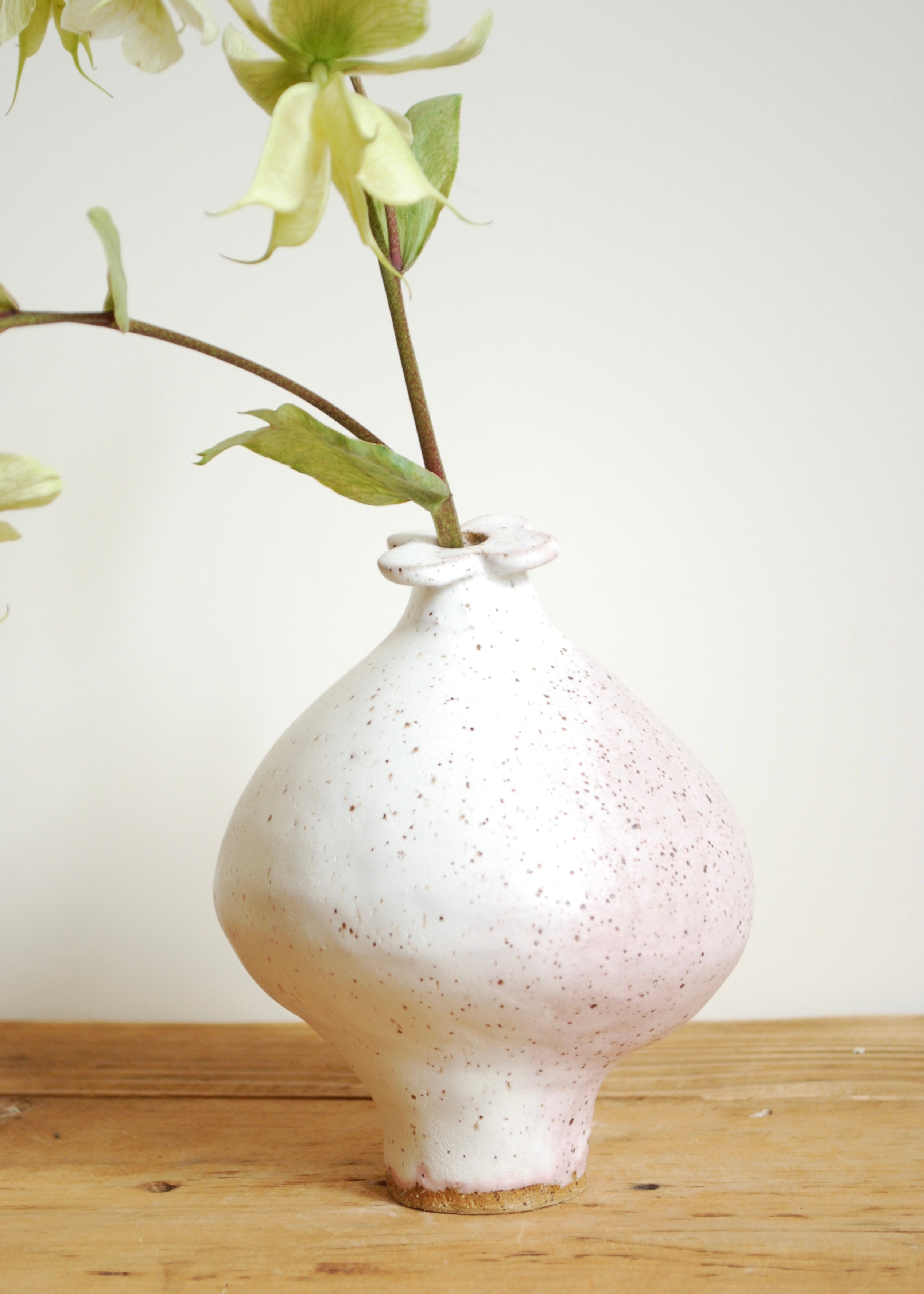 handmade speckled glaze ceramic mini blueberry shaped vase with pink hue