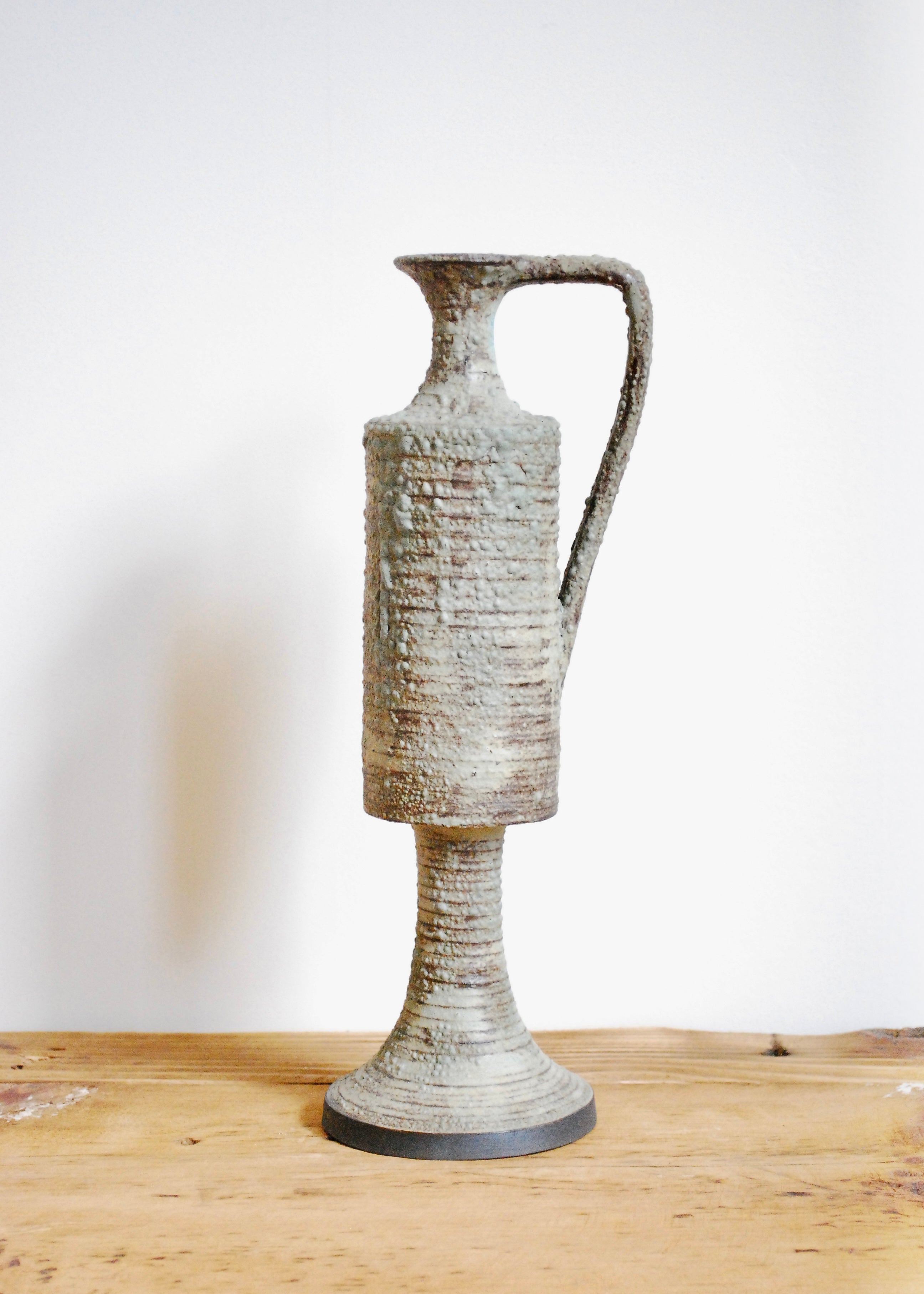Ornate handmade ceramic pitcher jug with handle and textural worn glaze in Sea foam and gray