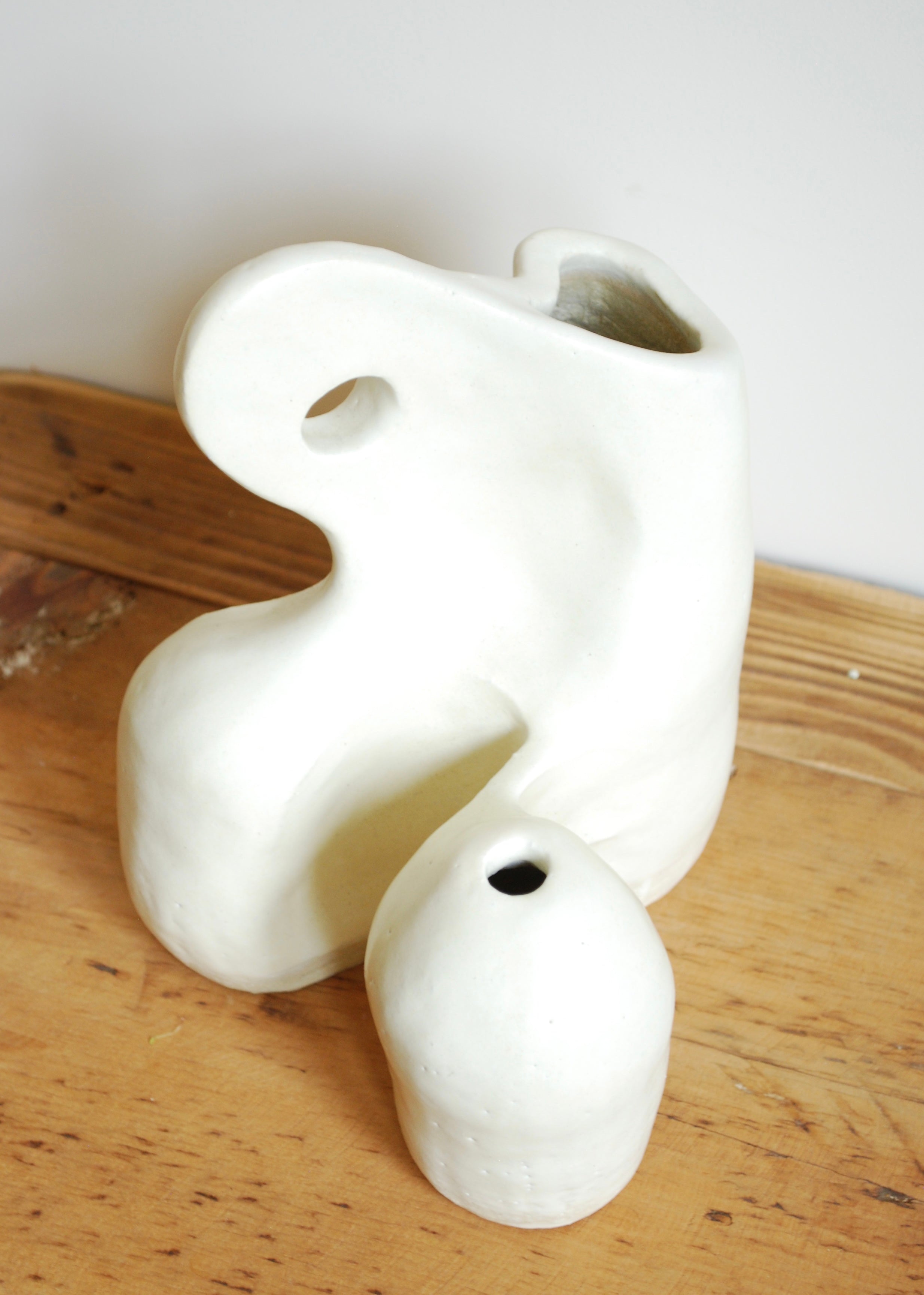organic shape multi hole handmade ceramic vase in cream glaze