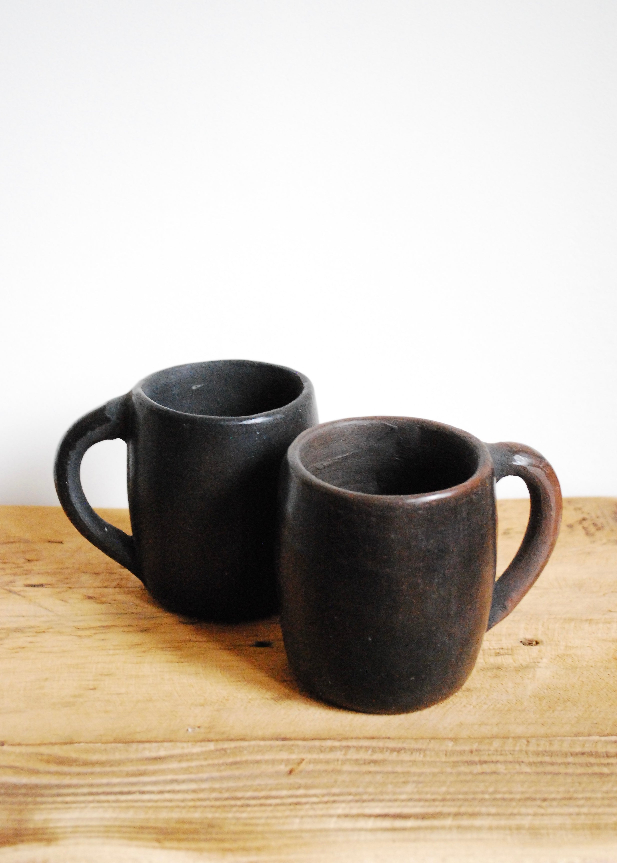 antique brown black Oaxaca pottery mugs