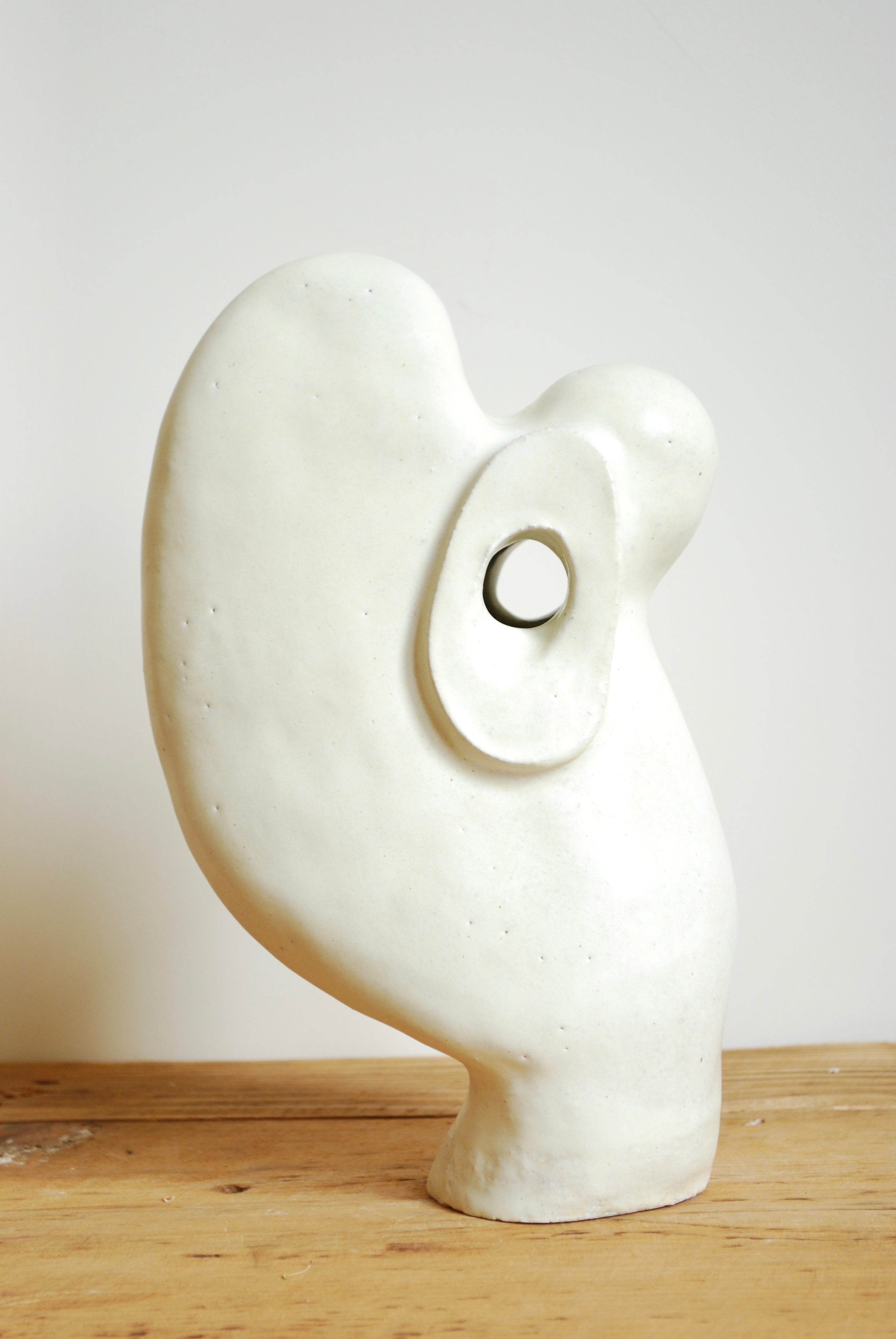 organic shape multi hole handmade ceramic vase in cream glaze